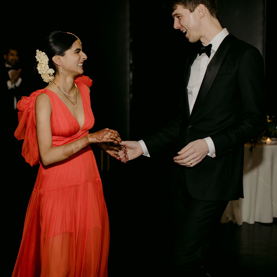 woman in red dress dancing