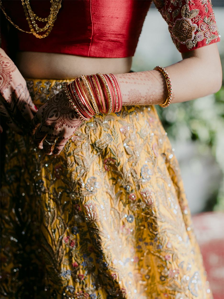 womans hand covered in henna