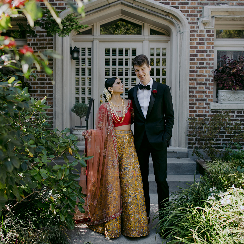 couple posing in a garden