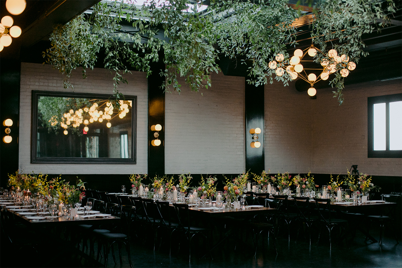 greenery hanging over dining tables