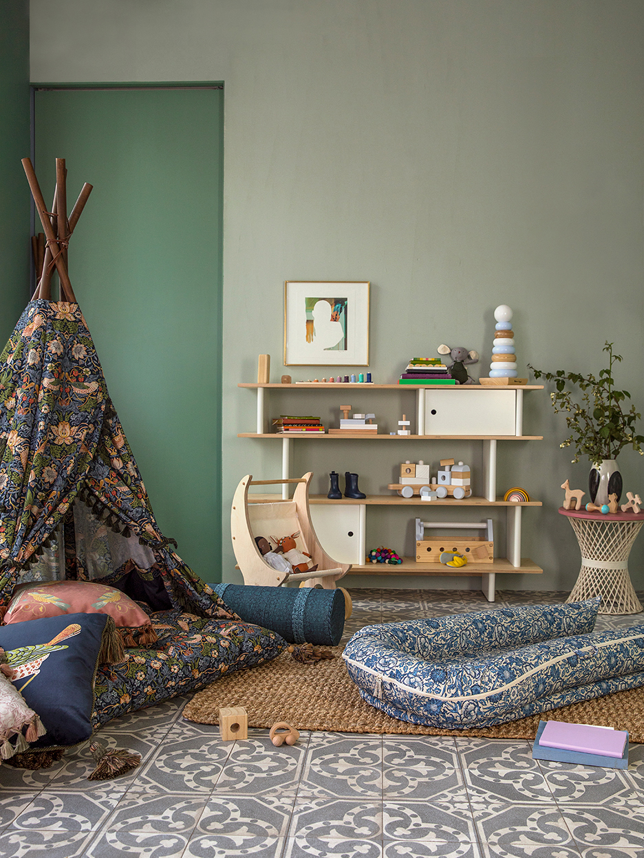 Tent with pillows and baby lounger