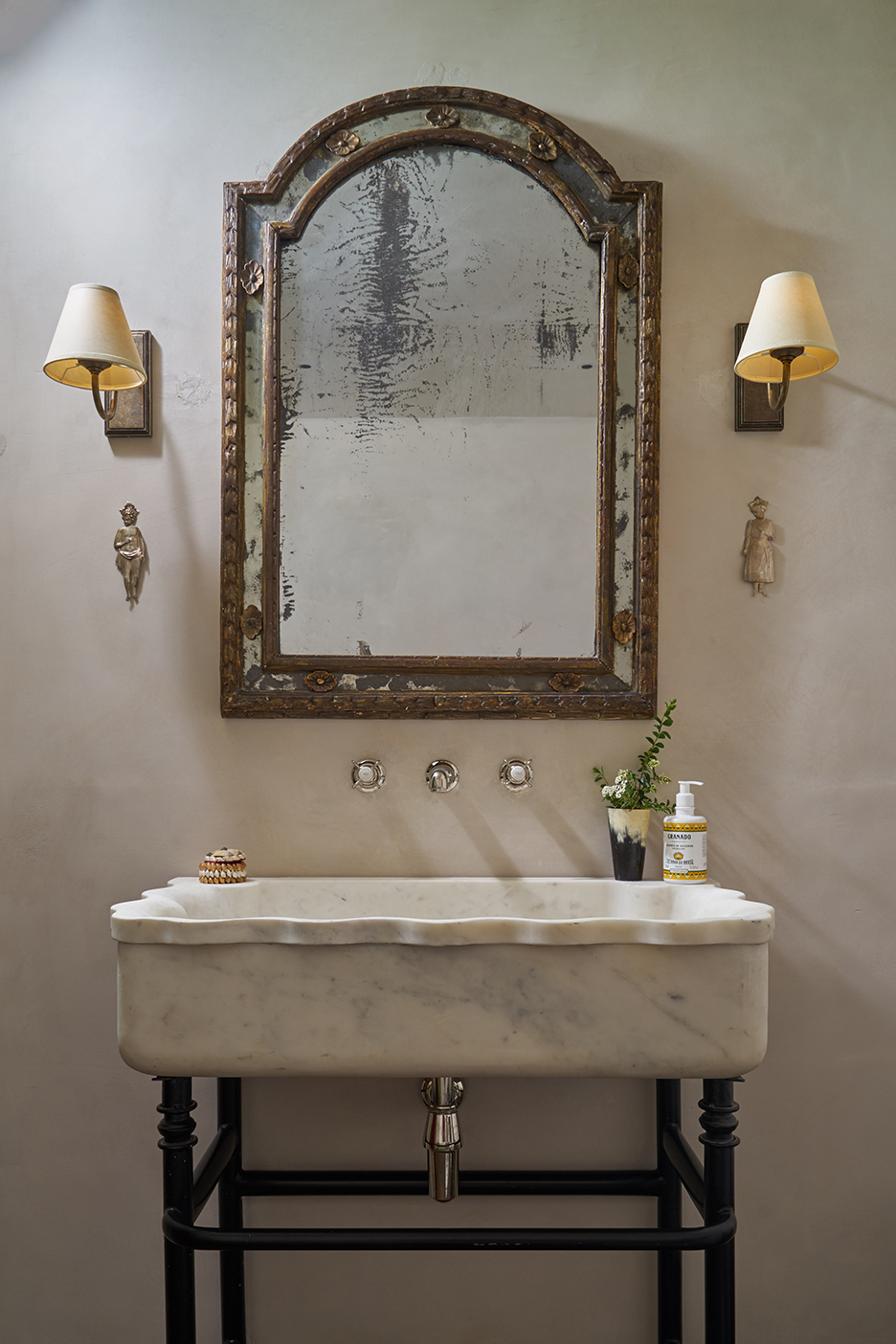 wavy marble sink in bathroom