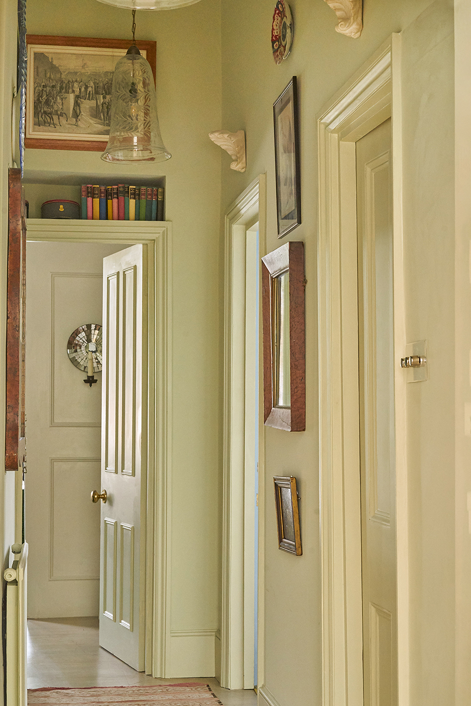 narrow hallway painted in yellow-beige