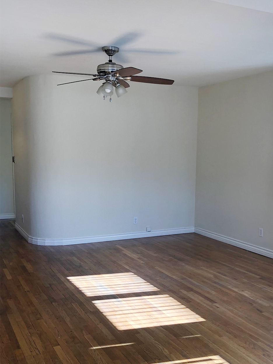 beige empty room with curved wall