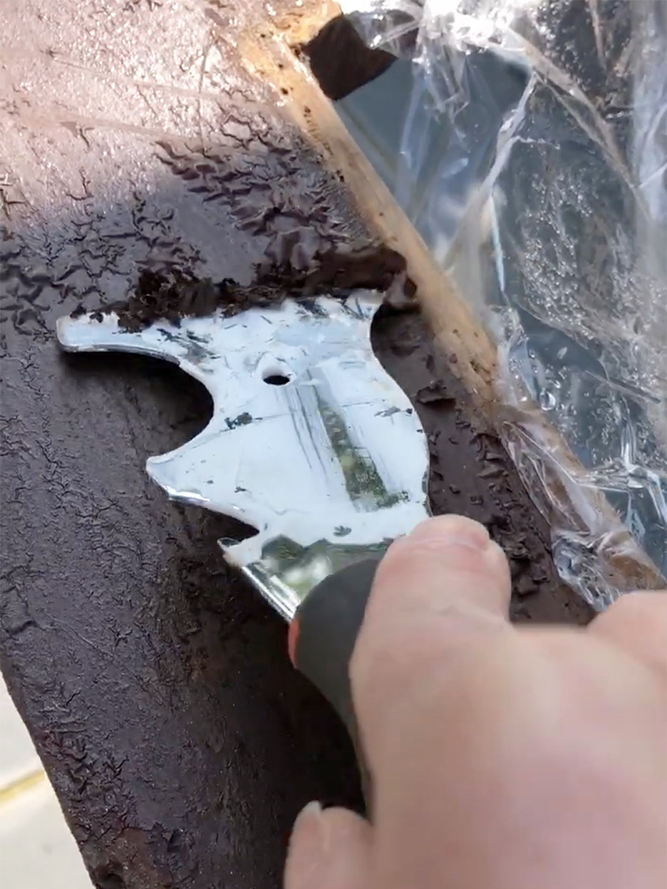 knife scraping wood