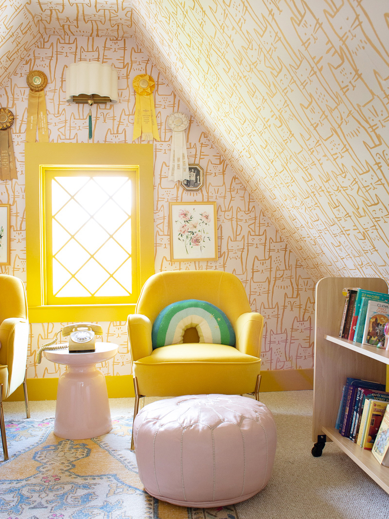 Wallpapered yellow kids playroom