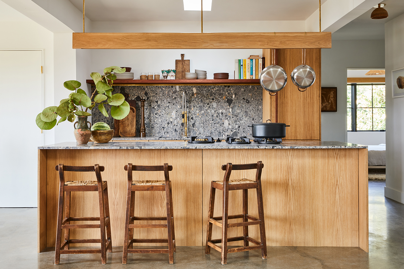 wood and stone open kitchen