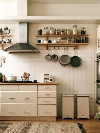 begie kitchen with exposed shelves