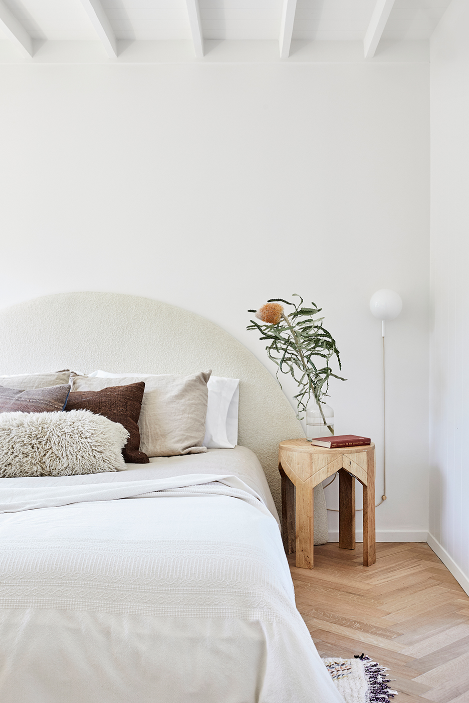 bed with fluffy headboard