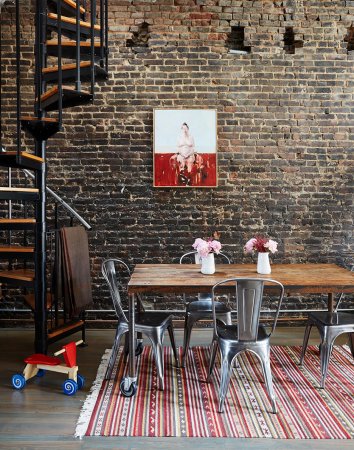 Dining room with brick wall