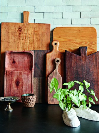 cutting boards up against a wall