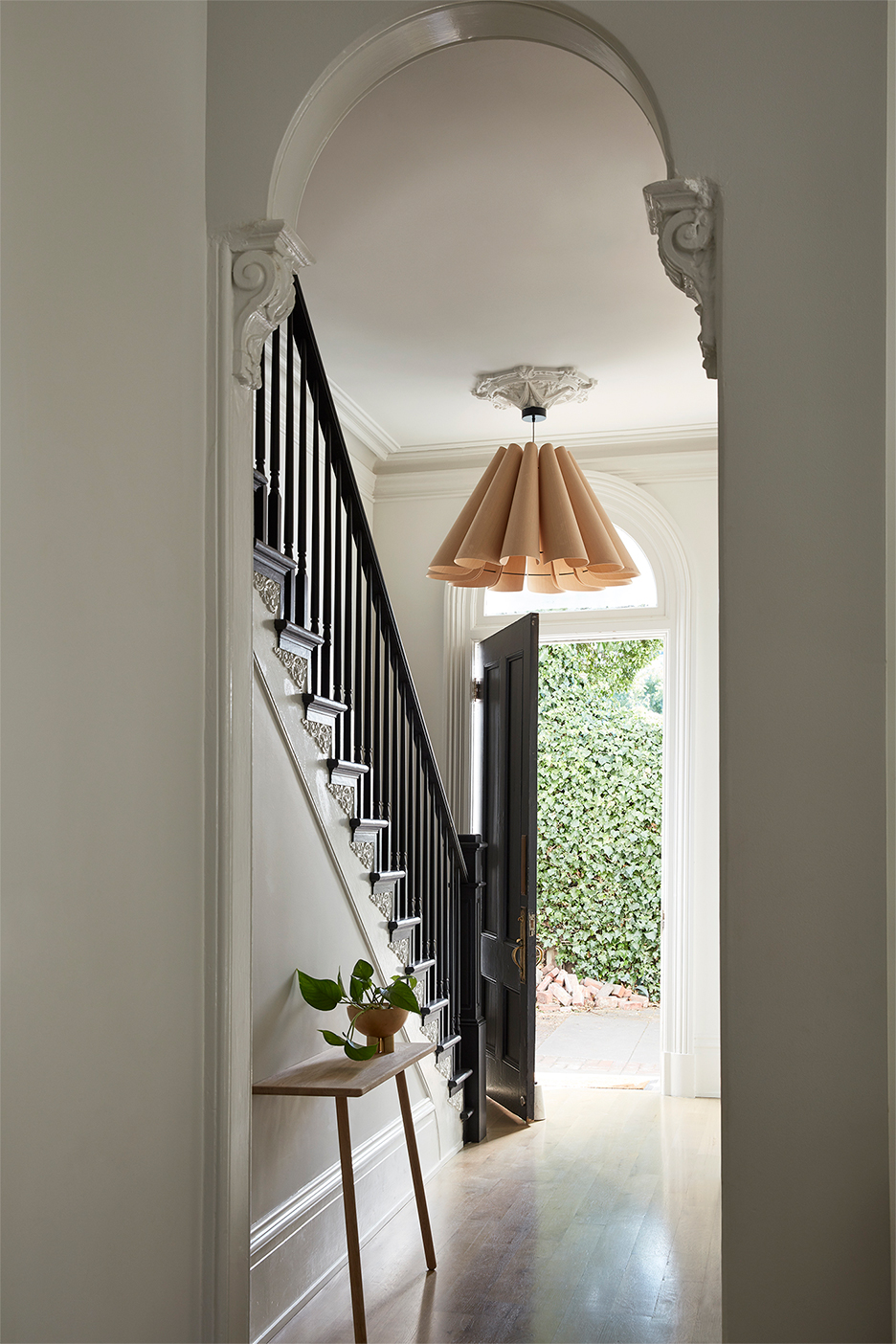 Statement lighting fixture in a entryway