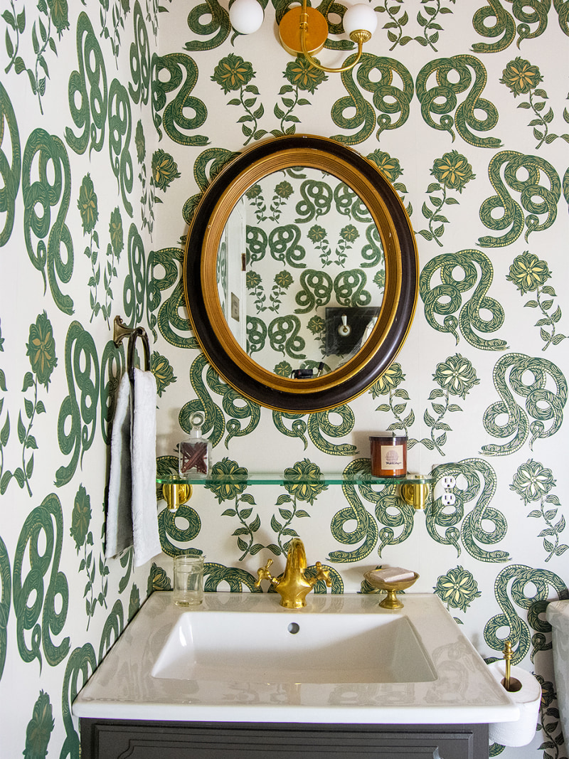 Snake wallpaper in a modern bathroom