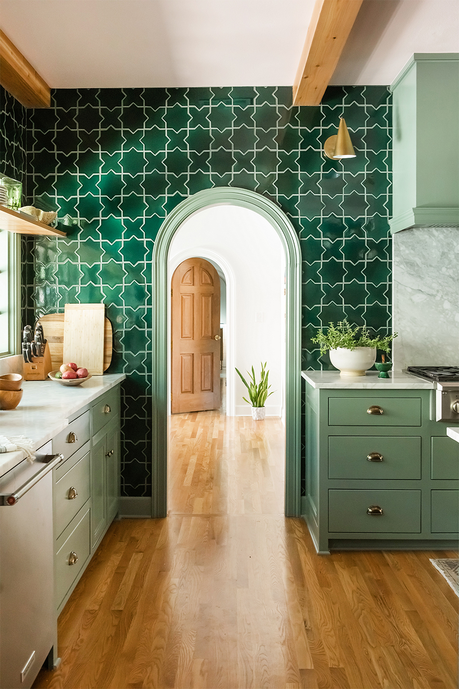 arch doorway leading out of kitchen