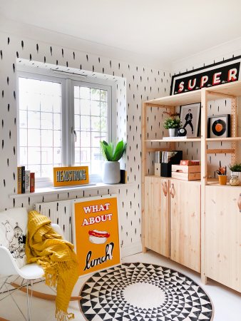 wood shelving in black and white room