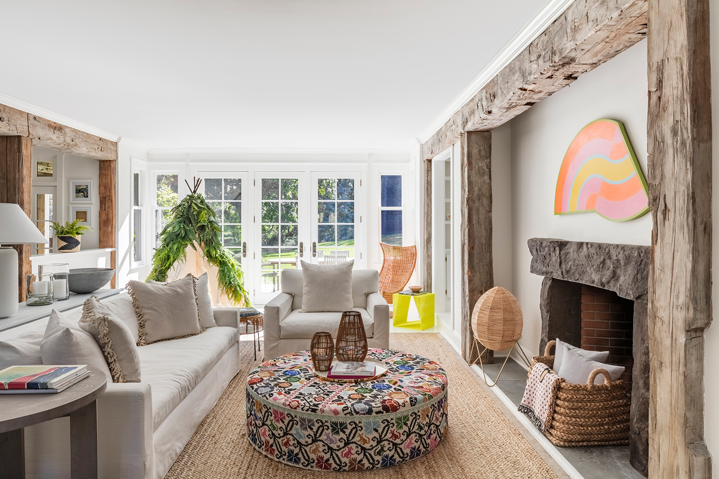 White living room with neon art