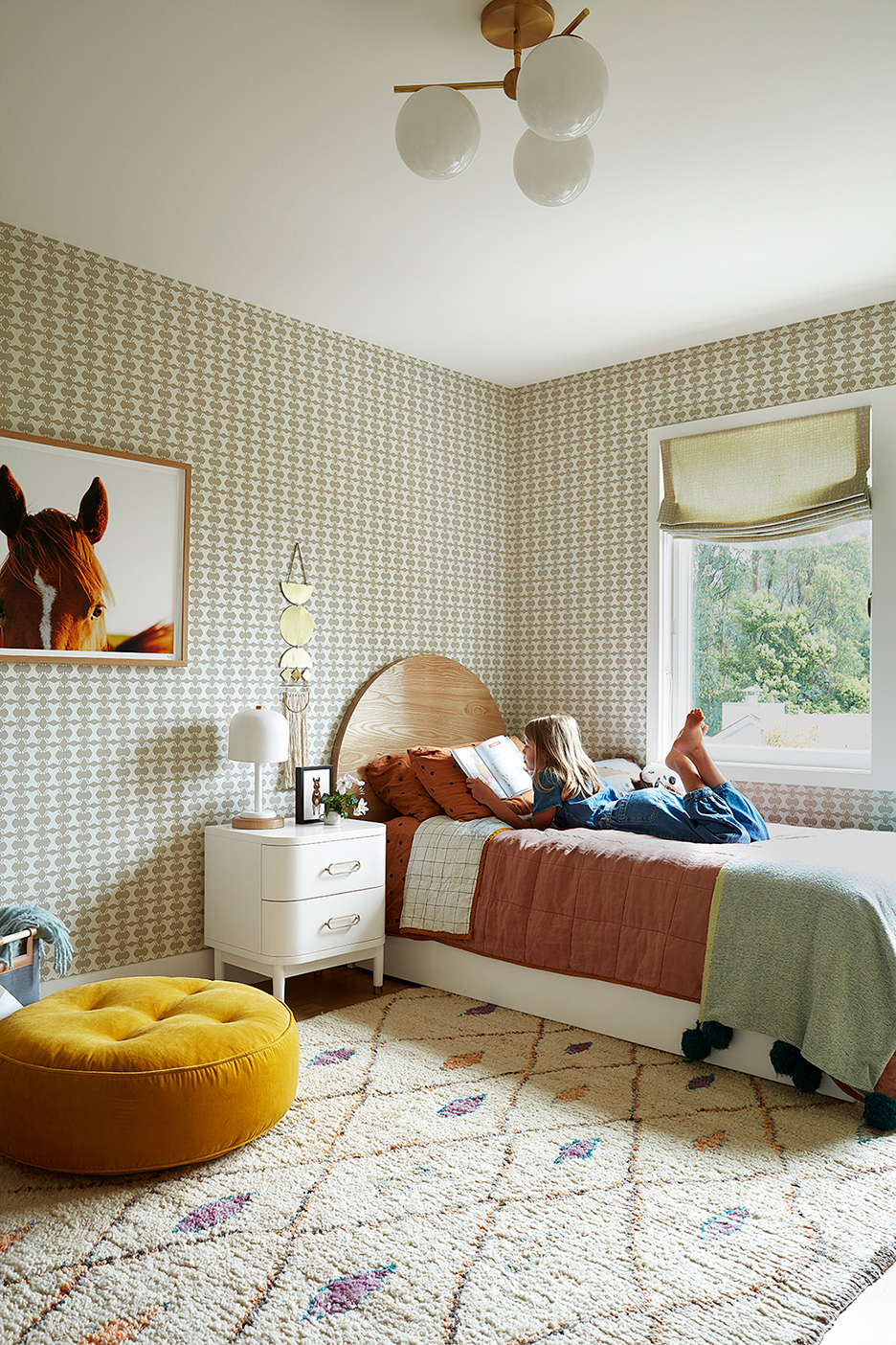 girl reading on bed