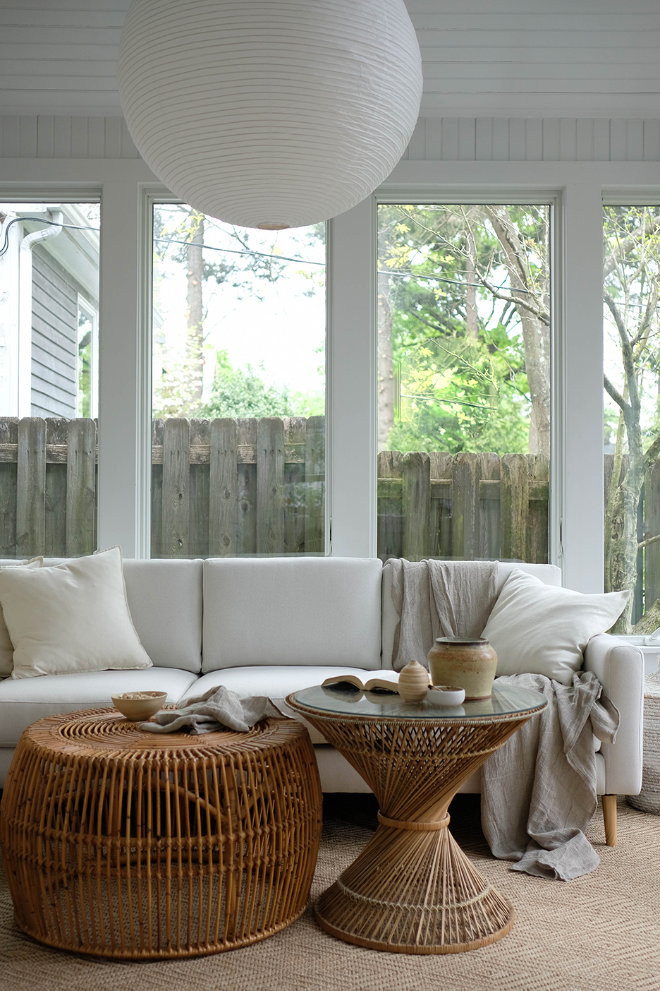 White sunroom with paper lantern