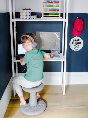 little boy at desk