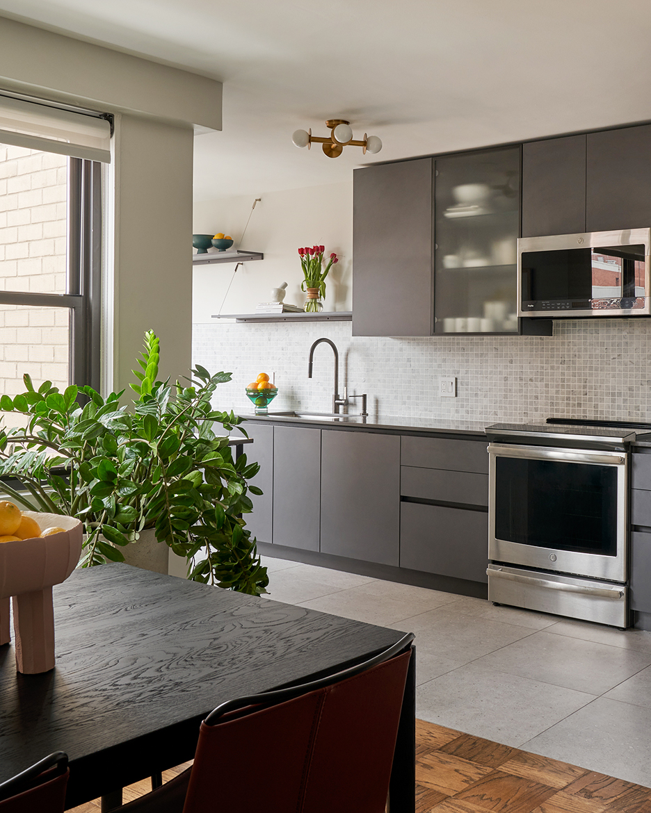 Kitchen with dark gray cabinets