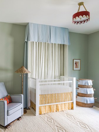 a nursery with canopy crib