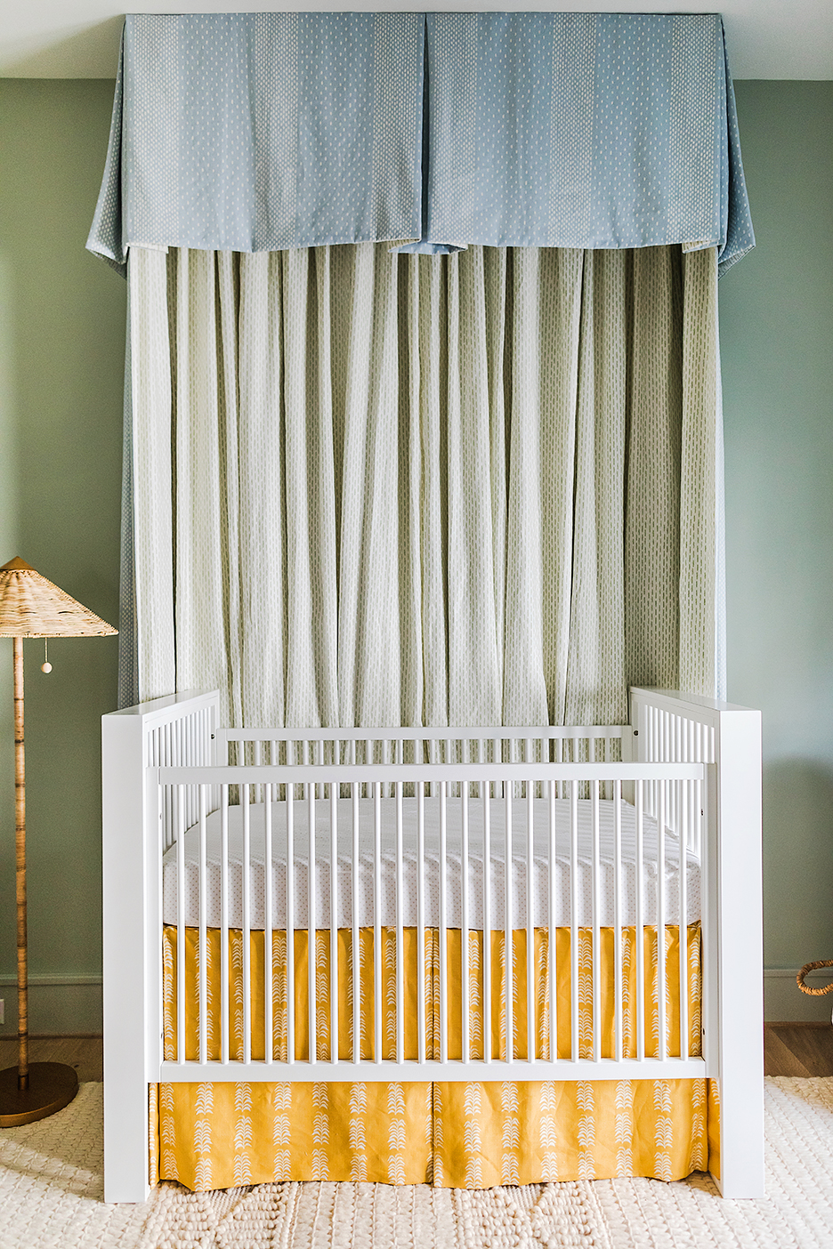 a nursery with canopy crib