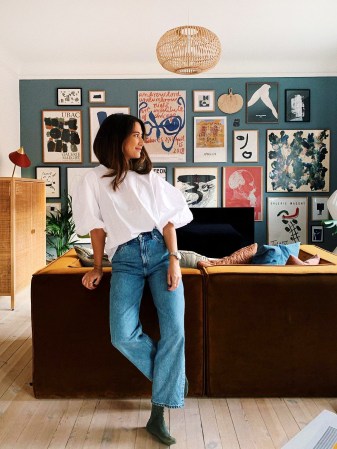 woman leanign on sofa