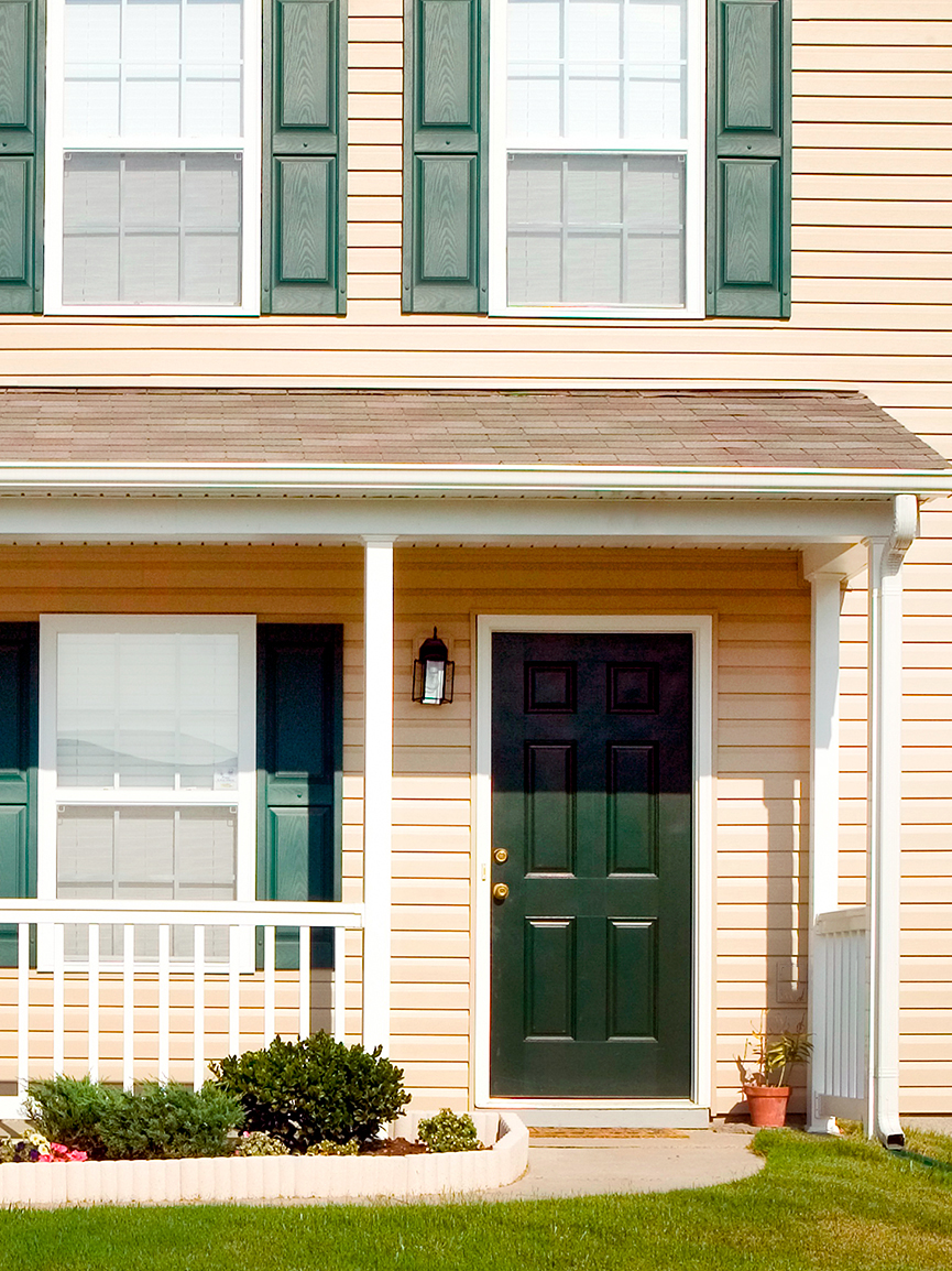 small house with green door