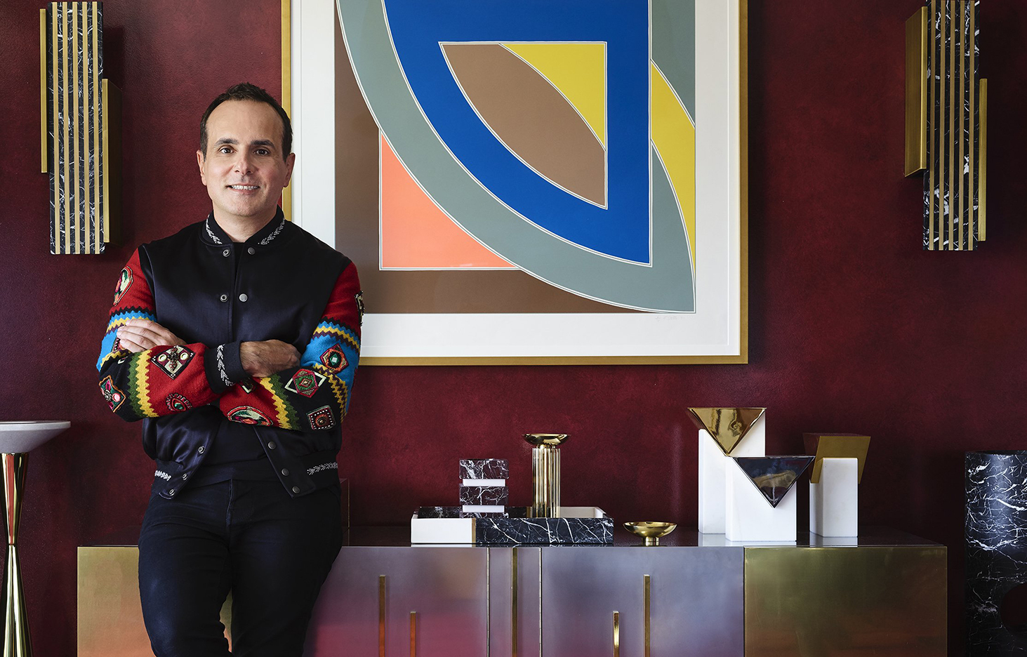 man leaning on credenza