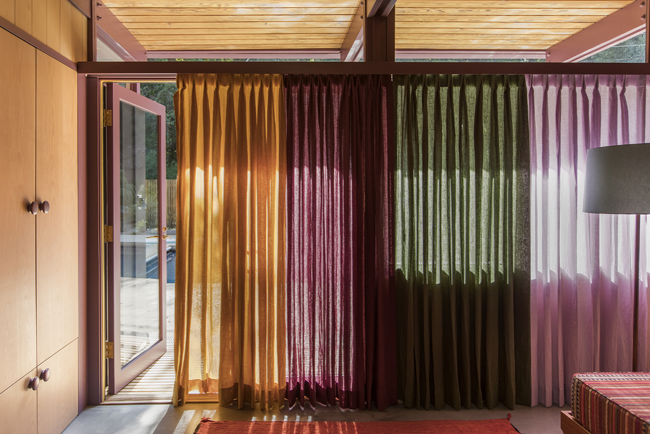 curtains running across a room