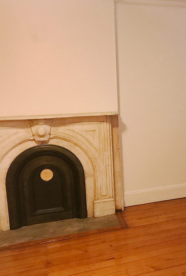 dated living room with wood floors