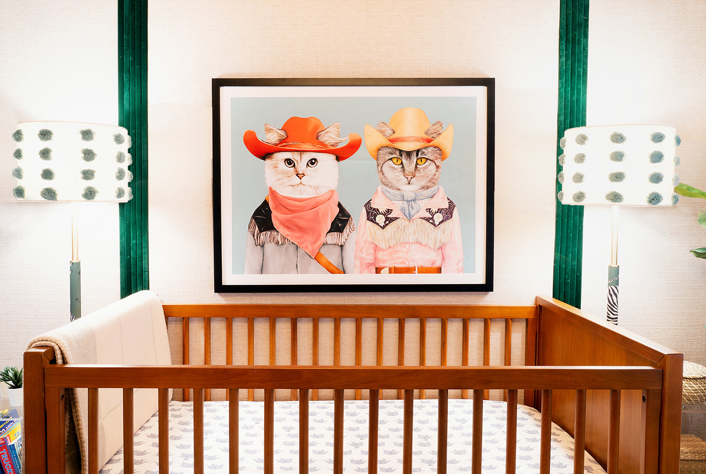 Nursery with rodeo-themed animal art
