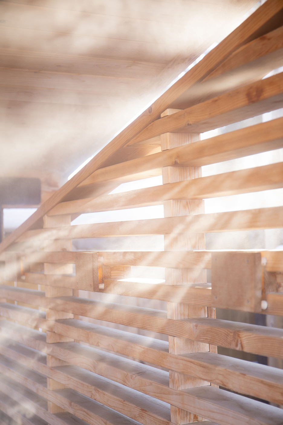 light streaming through slatted wall