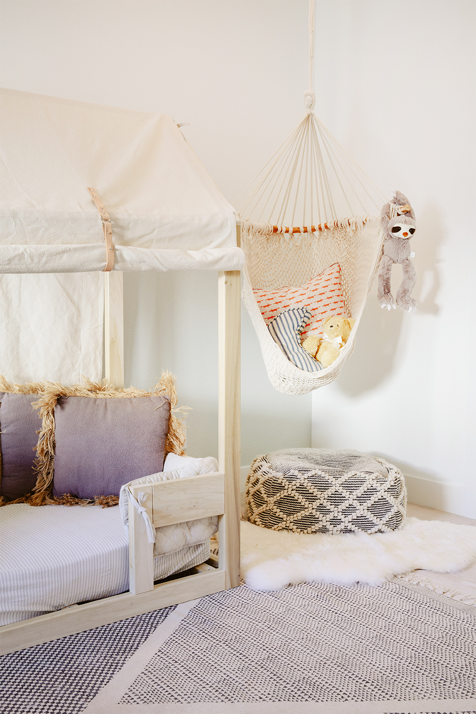 baby's room with floor bed