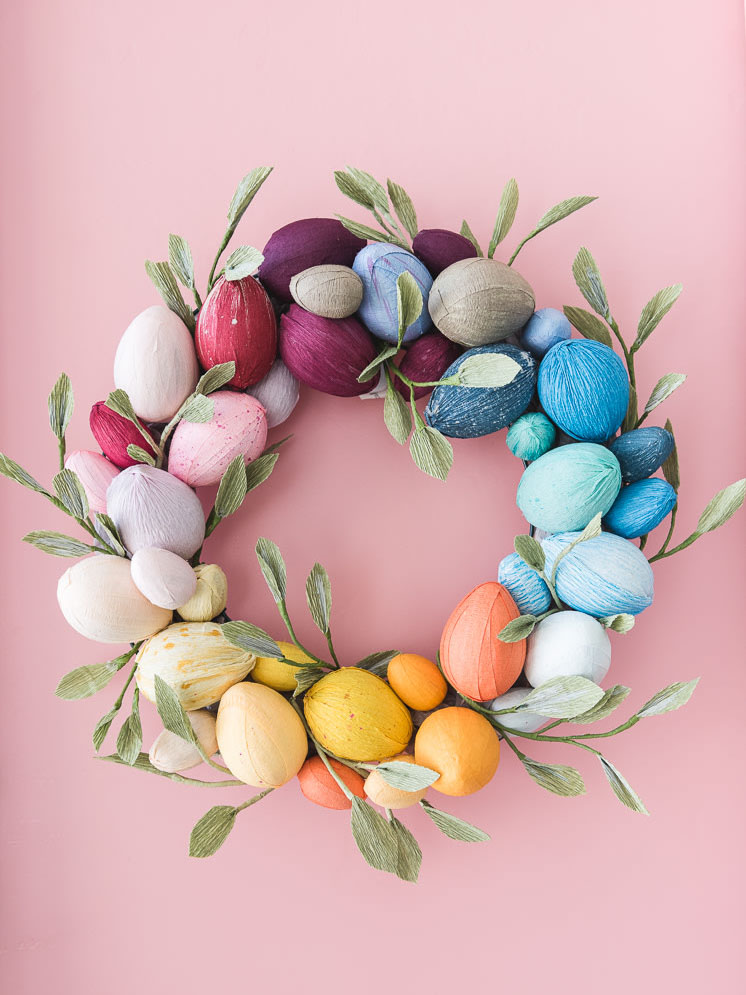 egg wreath on pink door