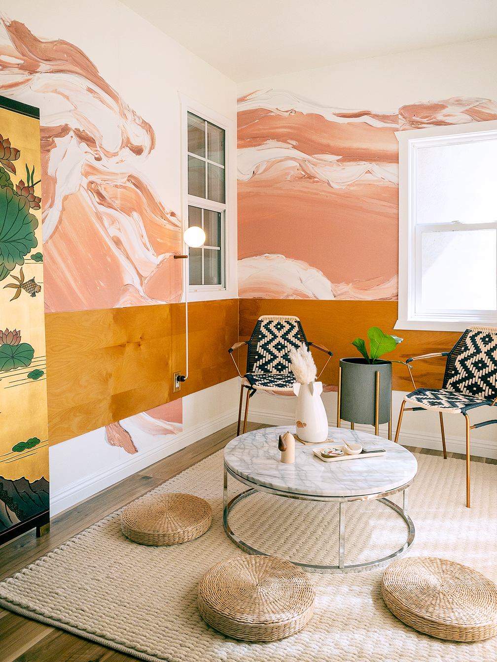 floor poufs around a coffee table