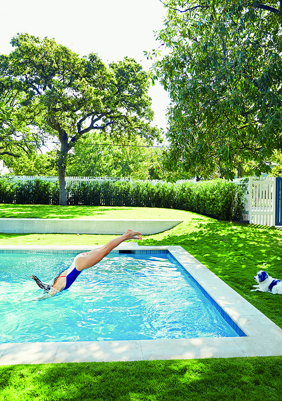 tyler swimming in her pool