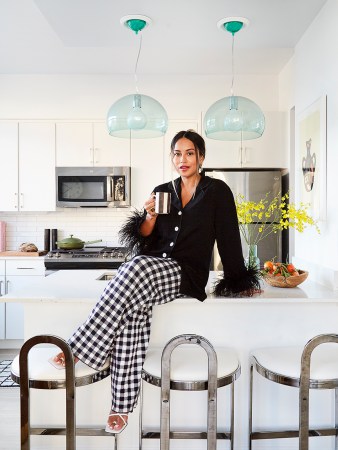 woman sitting on counter