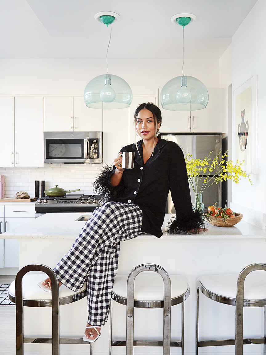 woman sitting on counter