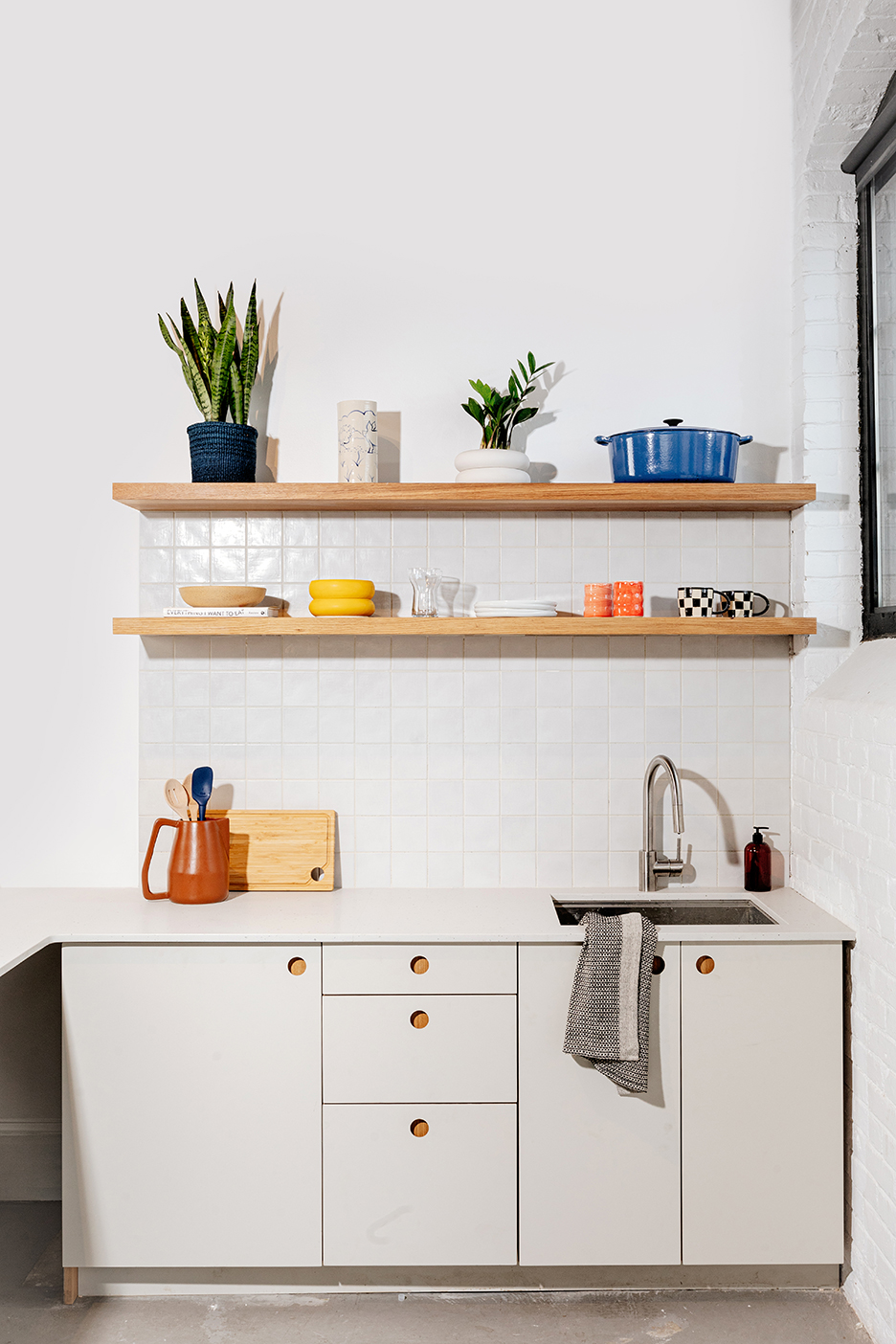 white kitchen with open shelves