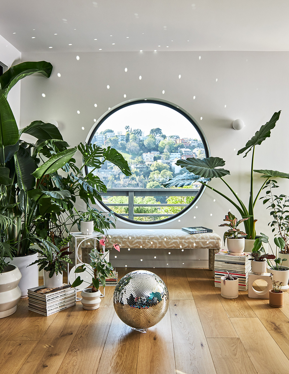 round window wit disco ball on floor