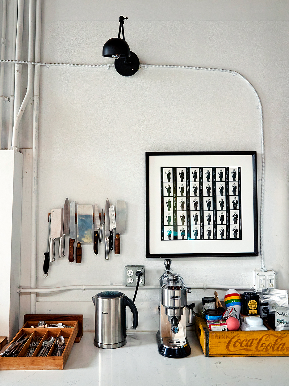 kitchen utensils in boxes on counter