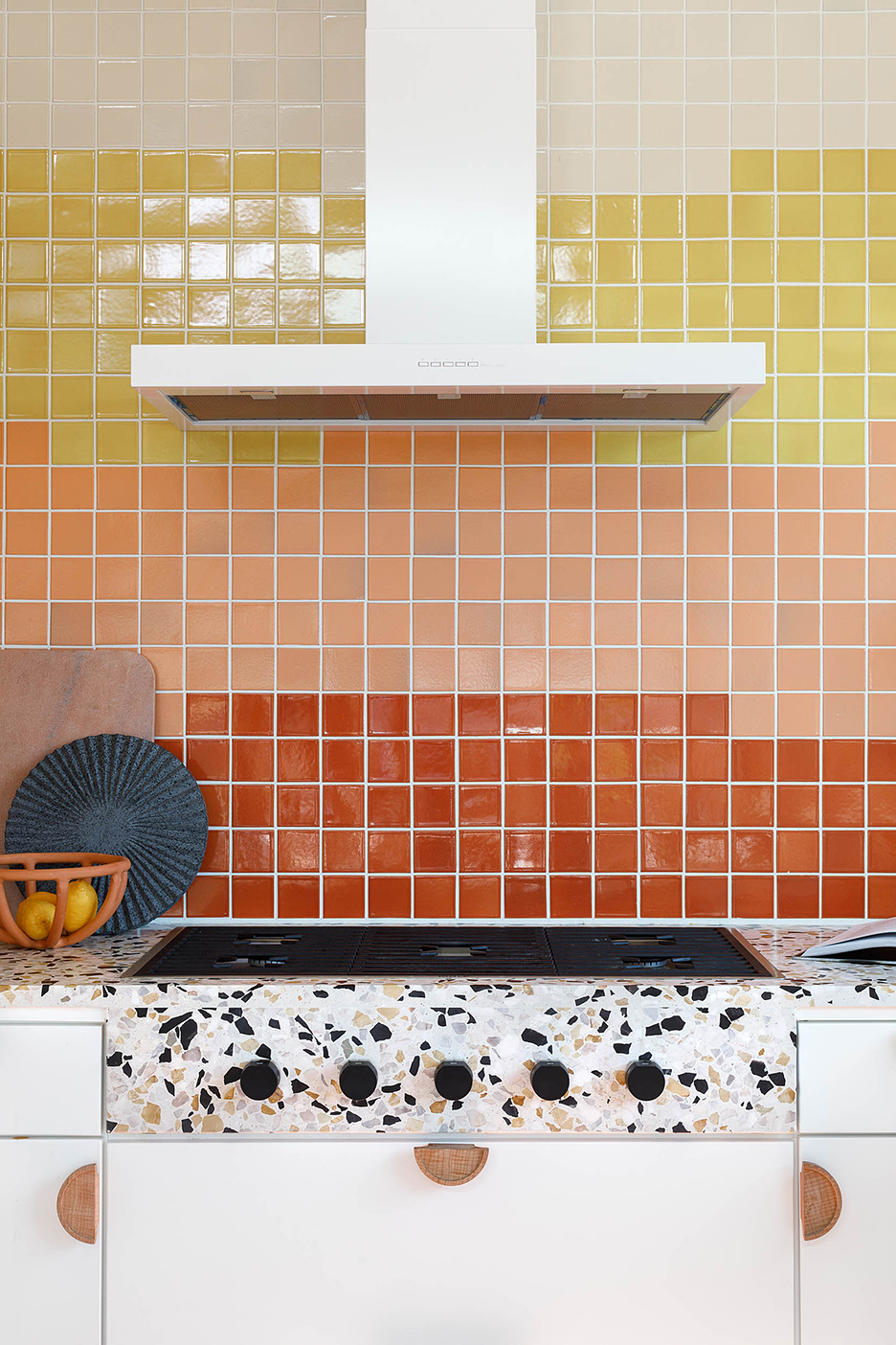 orange and pink and yellow backsplash