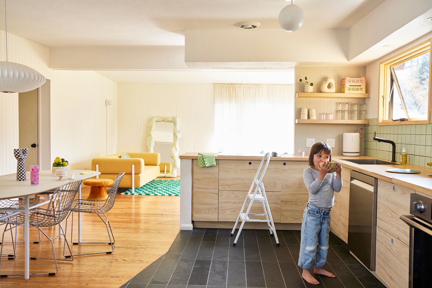 kid eating in the kithcen