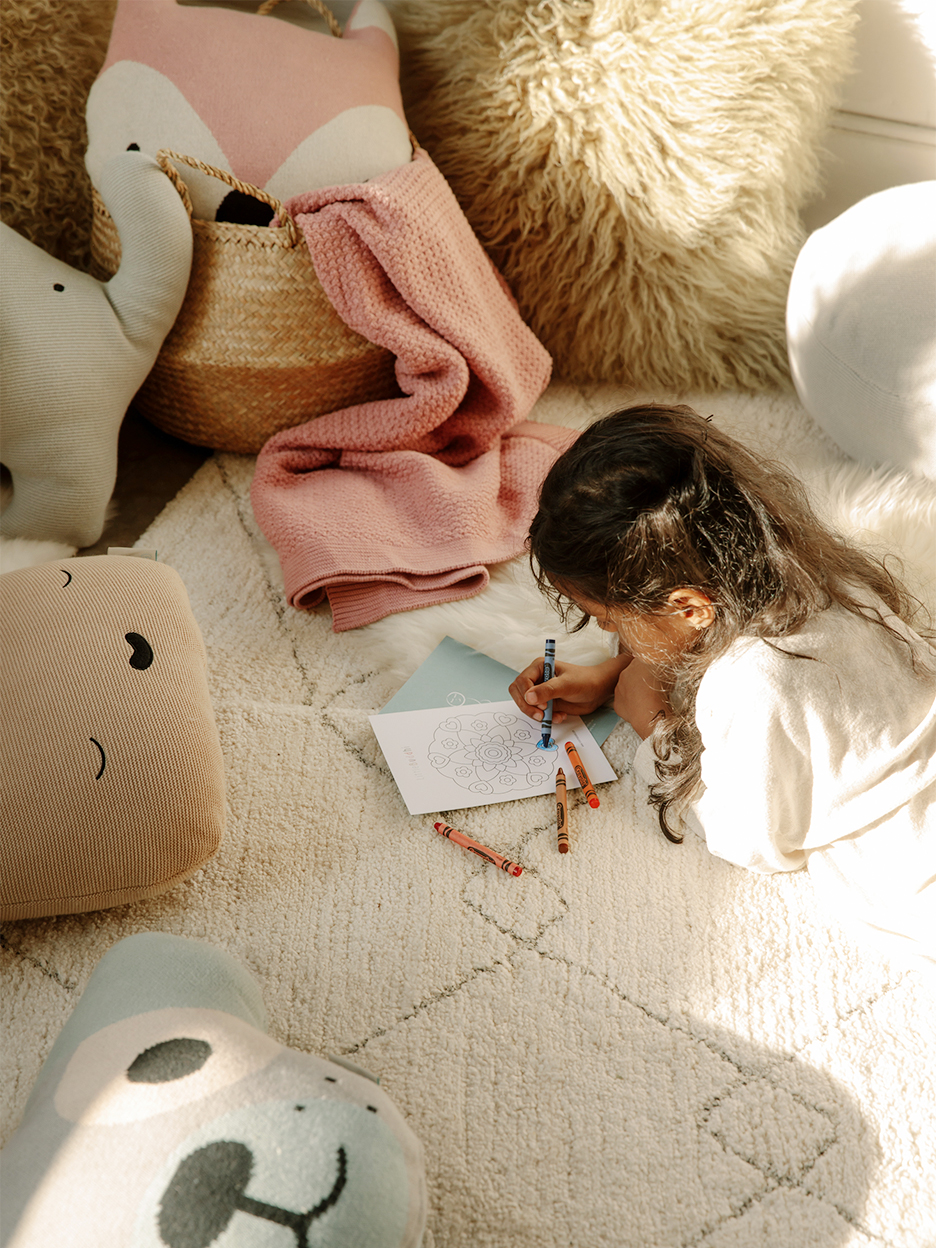 girl drawing on the ground