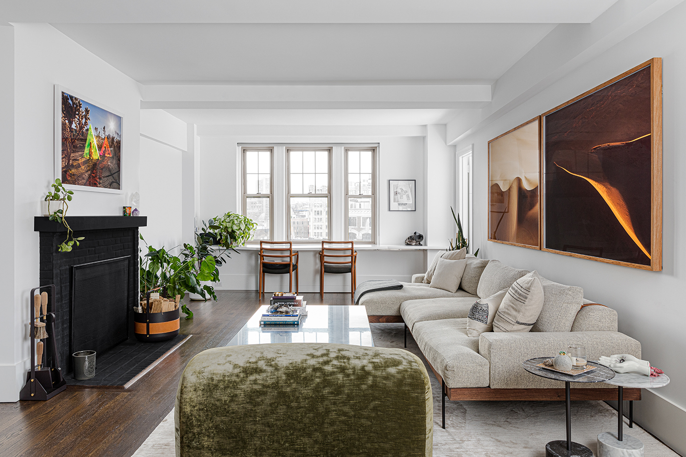 open and airing living room with black fireplace