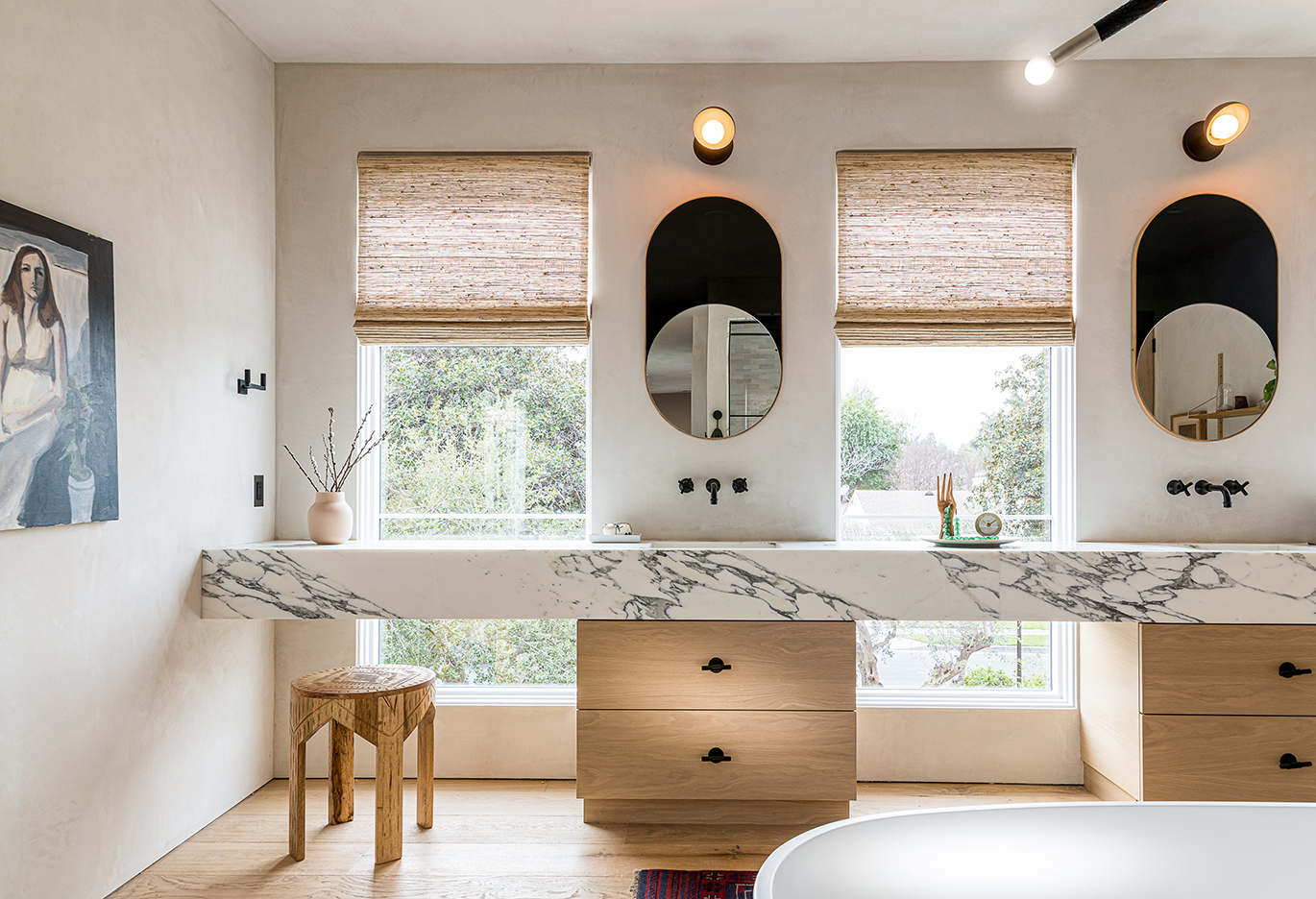 stone vanity across two wood cbainets