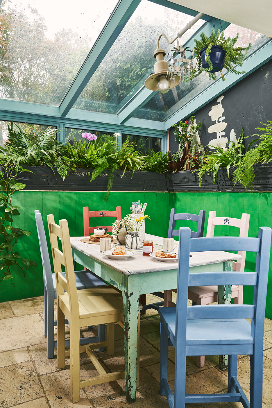 dining table wiht glass roof above