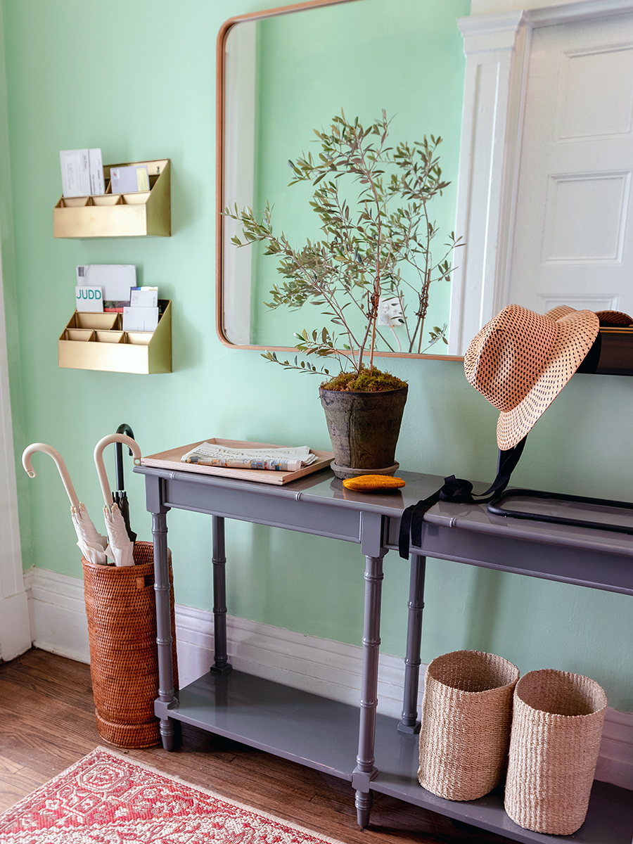 gray table with baskets undeneath