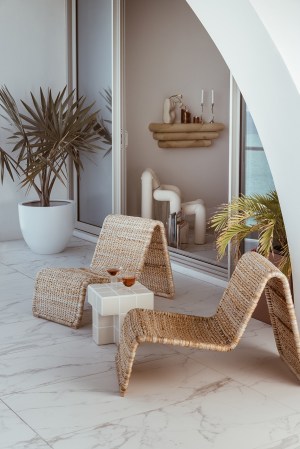 wicker lounge chairs on balcony